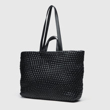 Load image into Gallery viewer, A woven tote bag in black color with zipper closure and light gold hardware.